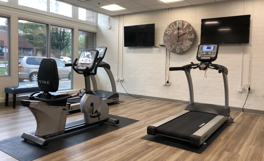 a gym with treadmills